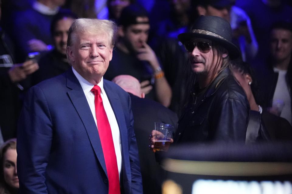 Former President Donald Trump, left, stands with Kid Rock at the UFC 295 mixed martial arts event Saturday, Nov. 11, 2023, in New York. (AP Photo/Frank Franklin II)