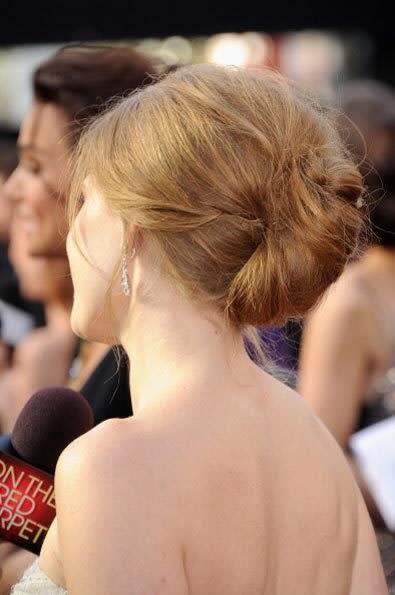 <b>Best Up ‘Do - Amy Adams:</b> The fair beauty wore her hair in a modern, messy take on the classic French Roll. With loose wisps framing her face, the pulled-back look showed off Amy’s strapless dress and décolletage.