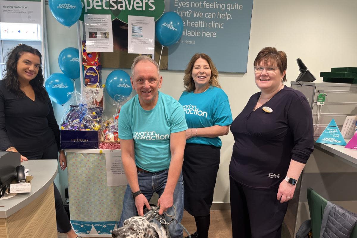 Nick Johnson with his English Setter Louis get a send off from staff at Specsavers' Three Horseshoes branch in Warminster <i>(Image: Specsavers)</i>