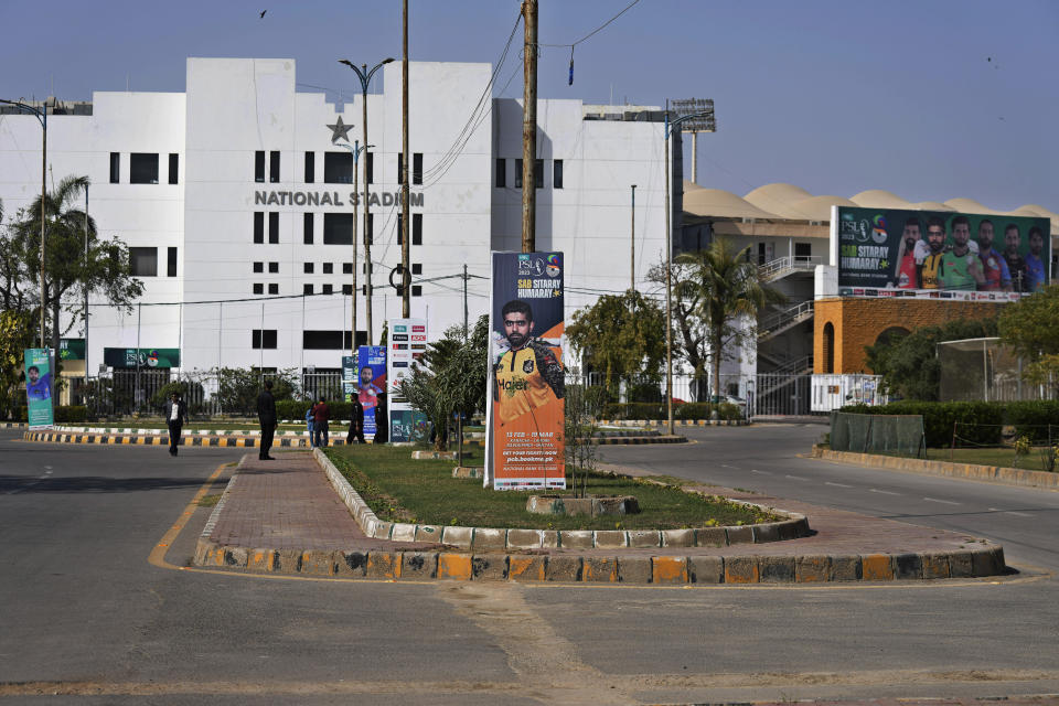 Big posters with the portraits of various cricketers are displayed outside the National Stadium for upcoming Pakistan Super League, in Karachi, Pakistan, Saturday, Feb. 11, 2023. Karachi will host the first leg of nine matches of Pakistan Super League Twenty20 cricket tournament, beginning from Monday. (AP Photo/Fareed Khan)