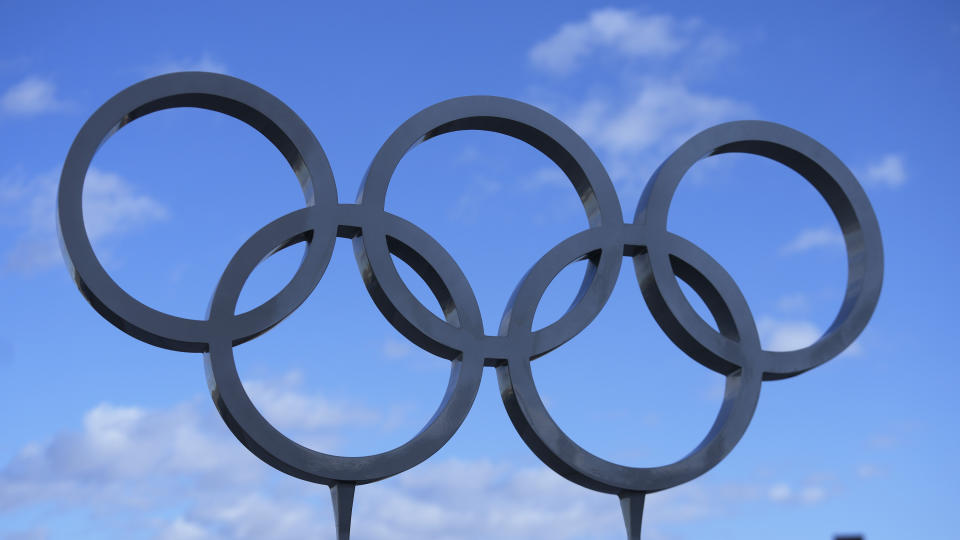 The 2002 Winter Olympic rings are shown outside Rice-Eccles Stadium, Wednesday, April 10, 2024, in Salt Lake City. Salt Lake City's enduring enthusiasm for hosting the Olympics was on display, when members of the International Olympic Committee came to Utah during a site visit ahead of a formal announcement expected this July to name Salt Lake City the host for the 2034 Winter Olympics. (AP Photo/Rick Bowmer)