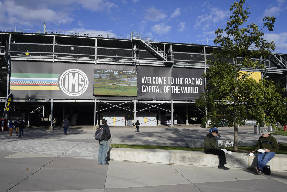 Fans arrive for a practice session for the IndyCar auto race at Indianapolis Motor Speedway, Thursday, Oct. 1, 2020, in Indianapolis. (AP Photo/Darron Cummings)