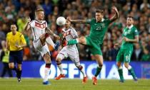 Football - Republic of Ireland v Germany - UEFA Euro 2016 Qualifying Group D - Aviva Stadium, Dublin, Republic of Ireland - 8/10/15 Germany's Marco Reus in action with Republic of Ireland's Jeff Hendrick Reuters / Phil Noble