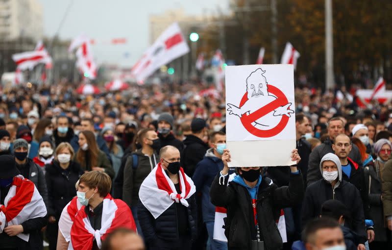 Belarusian opposition supporters hold a rally in Minsk