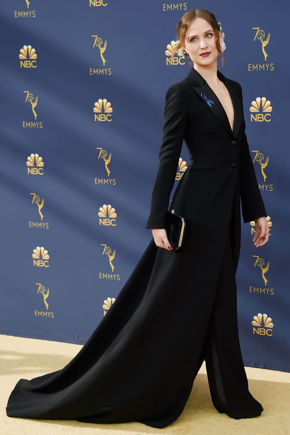 <p>Known for having a soft spot for trouser suits on the red carpet, Rachel Evan Wood stuck to what she knows best, but added a little drama for such a big night with a floor-length jacket and tailored trousers by Altuzarra.</p>