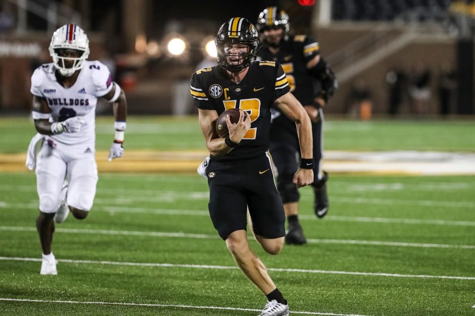 Missouri quarterback Brady Cook (12) rushes for a touchdown during the second half of the Tigers' game against Louisiana Tech on Thursday, Sept. 1, 2022, at Faurot Field.