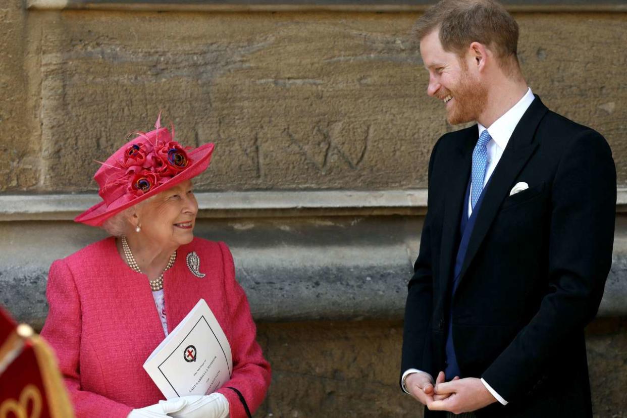 Britain's Queen Elizabeth II (L) and Britain's Prince Harry, Duke of Sussex, leave St George's Chapel in Windsor Castle, Windsor, west of London, on May 18, 2019, after the wedding of Lady Gabriella Windsor and Thomas Kingston. - Lady Gabriella, is the daughter of Prince and Princess Michael of Kent. Prince Michael, is the Queen Elizabeth II's cousin. (Photo by Steve Parsons / POOL / AFP)