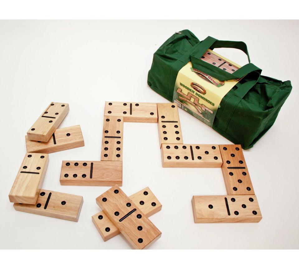 <p>Challenge your family and friends to a giant game of numerical skill.<br></p><p> <strong>Wooden Dominoes by Traditional Garden Games, £64.99, Argos</strong></p><p><a rel="nofollow noopener" href="http://www.argos.co.uk/product/4115379" target="_blank" data-ylk="slk:BUY NOW;elm:context_link;itc:0;sec:content-canvas" class="link ">BUY NOW</a></p>