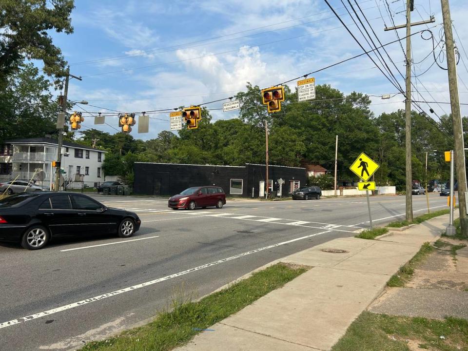 Cars pass through a crosswalk on Millwood Avenue installed in 2019.