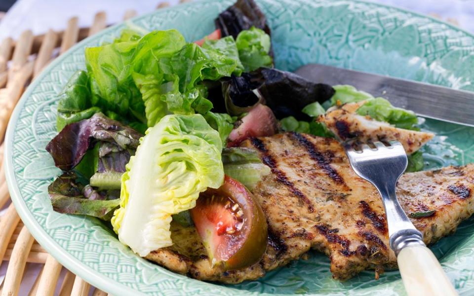 <p>Jon Ashton</p><p>Pounding boneless chicken breasts thin means they grill super fast. This marinade from chef Jon Ashton adds tons of flavor and keeps the white meat juicy. Add a green salad and dinner is served.</p><p><strong>Get the recipe: <a href="/681323/jonashton/thin-grilled-garlic-chicken/" data-ylk="slk:Thin Grilled Garlic Chicken;elm:context_link;itc:0;sec:content-canvas" class="link "><em>Thin Grilled Garlic Chicken</em></a></strong></p>