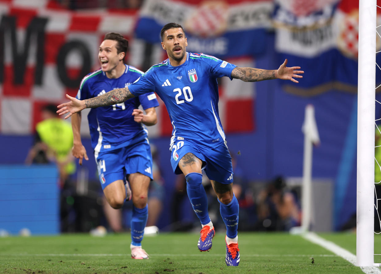 Italy's Mattia Zaccagni celebrates scoring the tying goal against Croatia during stoppage time of their Euros match on Monday in Leipzig, Germany. (Photo by Alex Pantling - UEFA/UEFA via Getty Images)