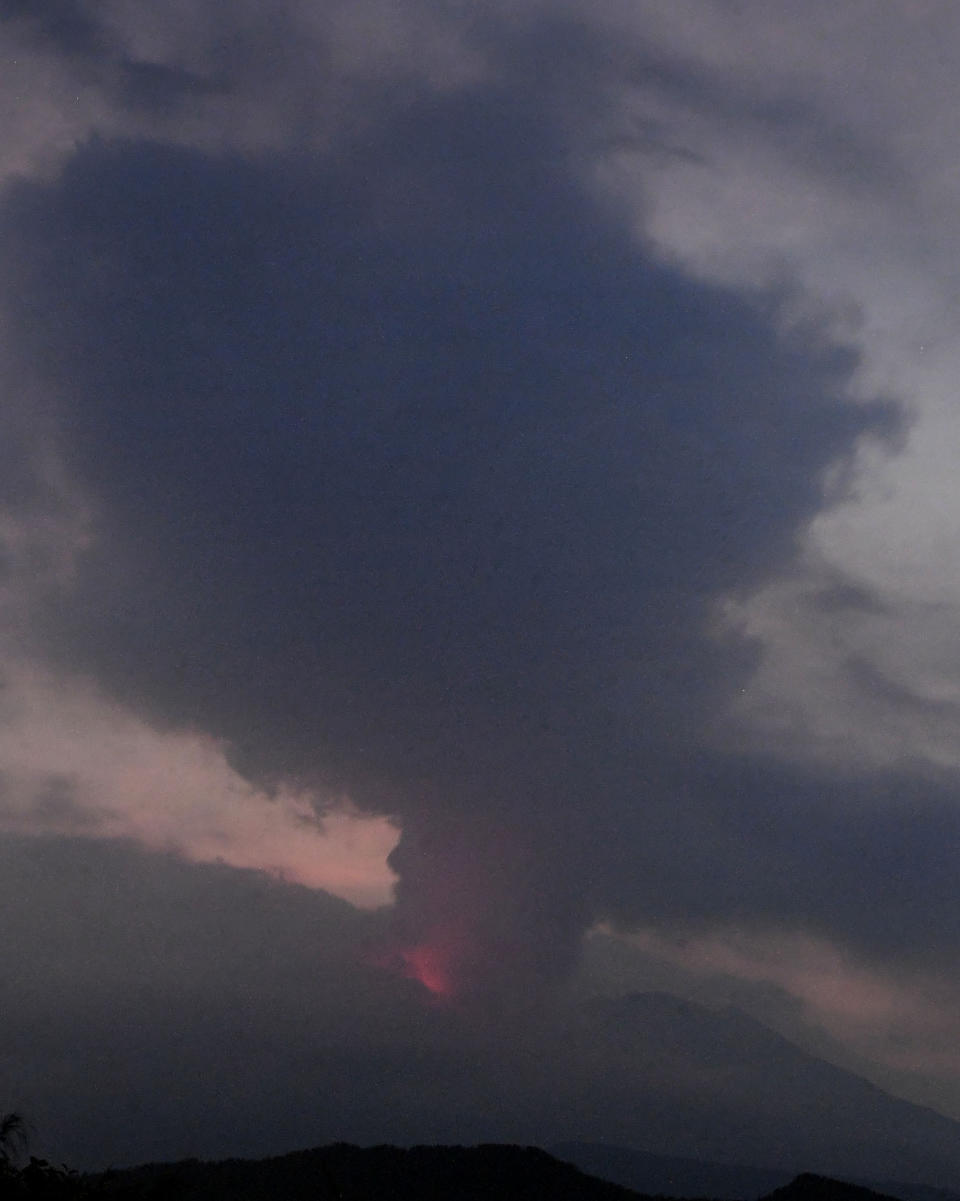 This long exposure image shows the eruption of volcano Sakurajima Sunday night, July 24, 2022, in the view from Tarumizu city, Japan's southern prefecture of Kagoshima. Japan’s Meteorological Agency said a volcano on Japan’s southern main island of Kyushu erupted Sunday night, spewing ash and volcanic rocks, but there were no immediate reports of damage or injuries in nearby towns. (Kyodo News via AP)