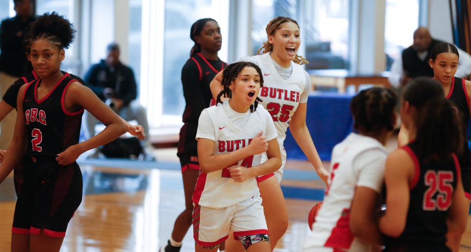 Butler’s Malia Patrick and Mariah Knight celebrate winning against George Rogers Clark in an LIT semifinal Saturday.