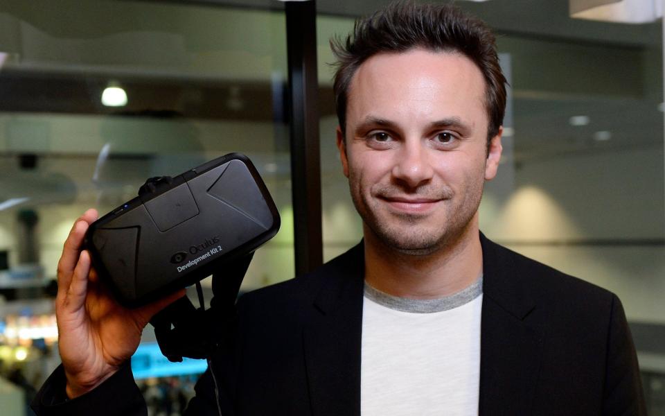 Former Oculus chief executive Brendan Iribe with an Oculus headset in 2014 - Reuters