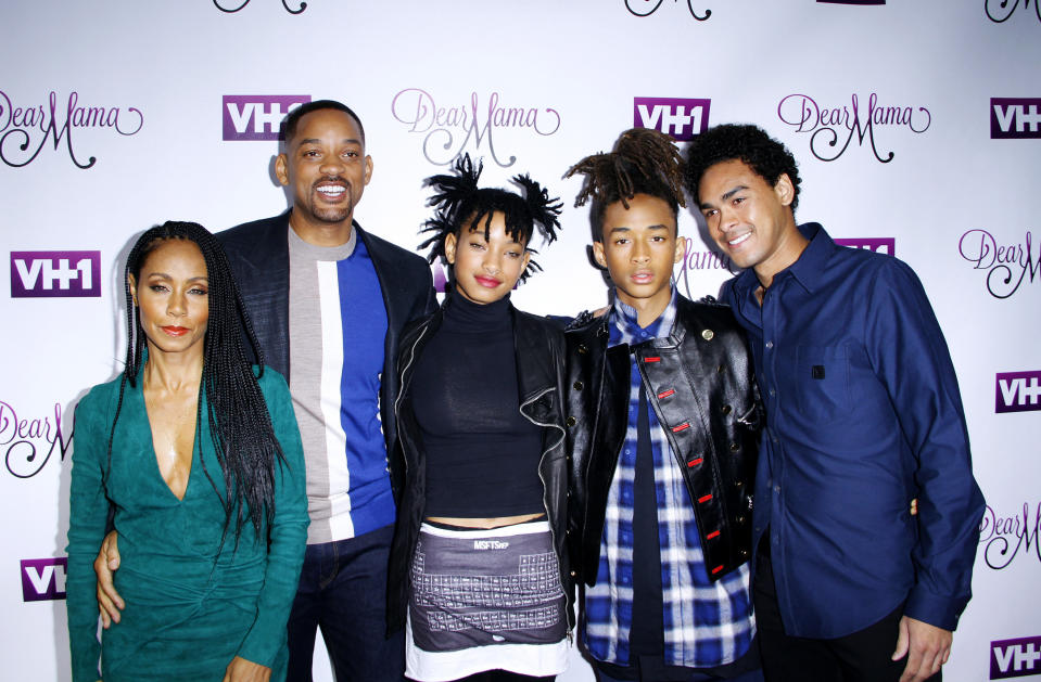 Jada Pinkett Smith, Will Smith, Willow Smith, Jaden Smith, and Trey Smith on a red carpet