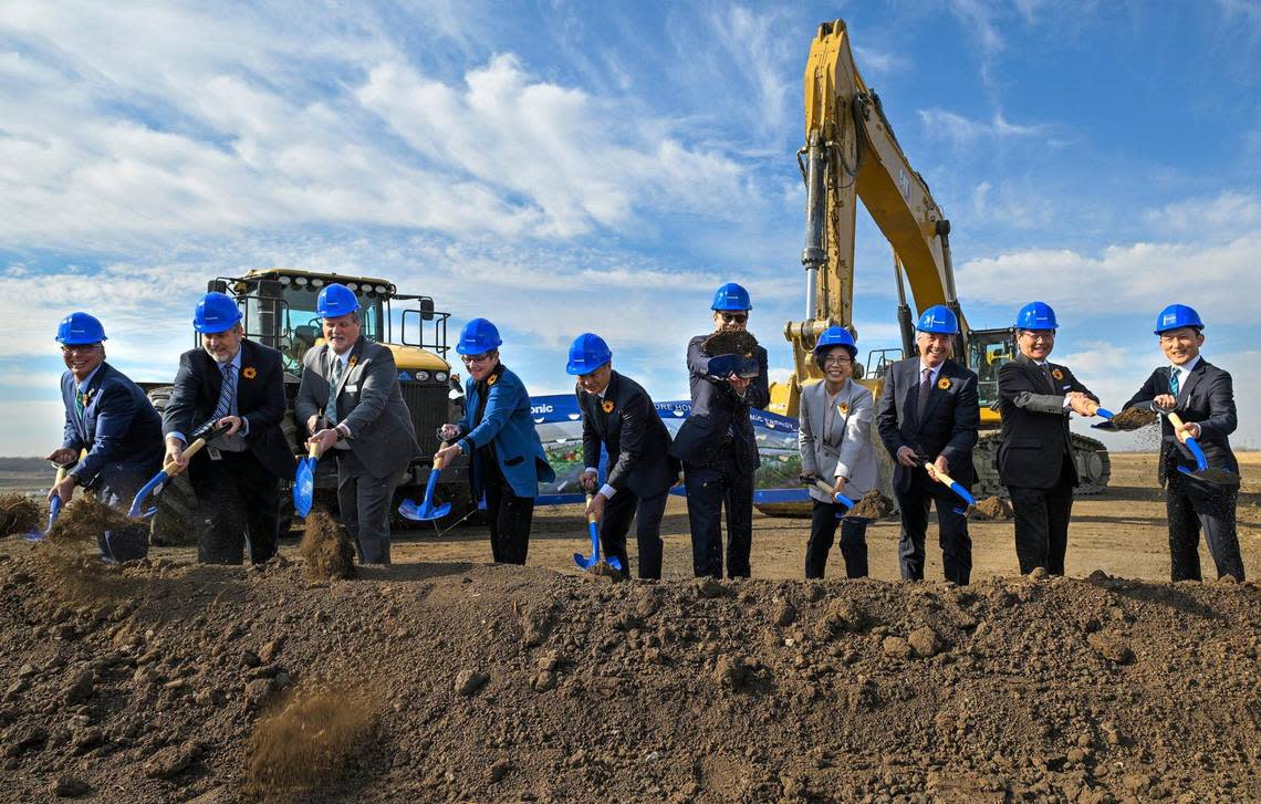 Groundbreaking ceremonies for the Panasonic battery plant included Kansas Gov. Laura Kelly, fourth from left, Kazuo Tadanobu President and CEO of Panasonic Energy of North America, right of Kelly, and other top executives from Panasonic, as well as state and local officials.