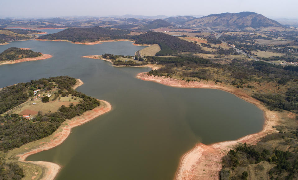 FILE - In this Aug. 25, 2021 file photo, a general view of the Jaguari dam, which is part of the Cantareira System, responsible for providing water to the Sao Paulo metropolitan area, during a drought in Braganca Paulista, Brazil. Brazil is in the throes of its worst drought in 91 years, which has returned the spectre of power rationing. (AP Photo/Andre Penner, File)