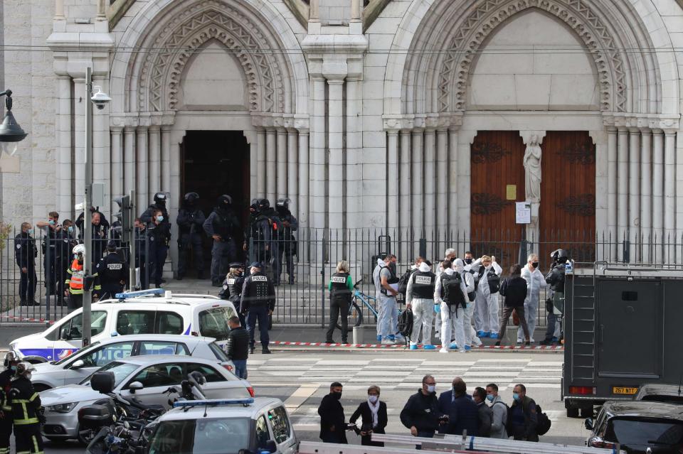 <p>Emergency services at the basilica where the attack took place</p>AFP via Getty Images