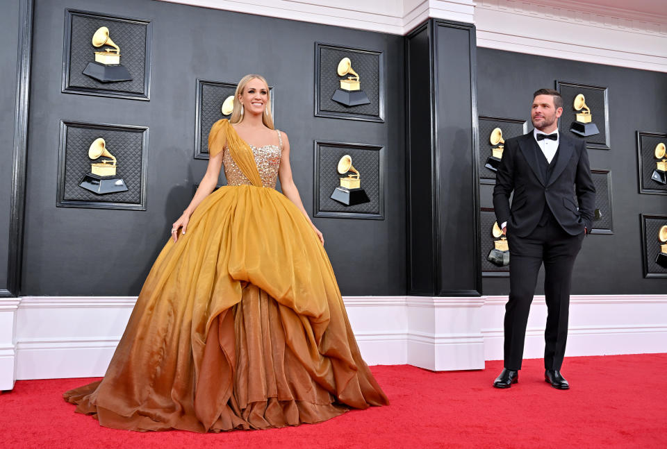 Mike letting Carrie shine on the red carpet