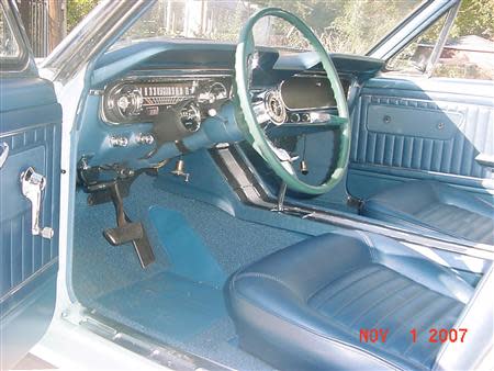 The interior of Gail Wise's Skylight Blue 1964 1/2 Ford Mustang convertible is seen after its restoration in Park Ridge, Illinois November 1, 2007. Gail Wise, then using her maiden name of Gail Brown, made the first known retail purchase of a Mustang on April 15, 1964, two days before the model went on sale.The car was garaged in 1979, until its restoration 27 years later. REUTERS/Courtesy of Tom and Gail Wise/Handout via Reuters