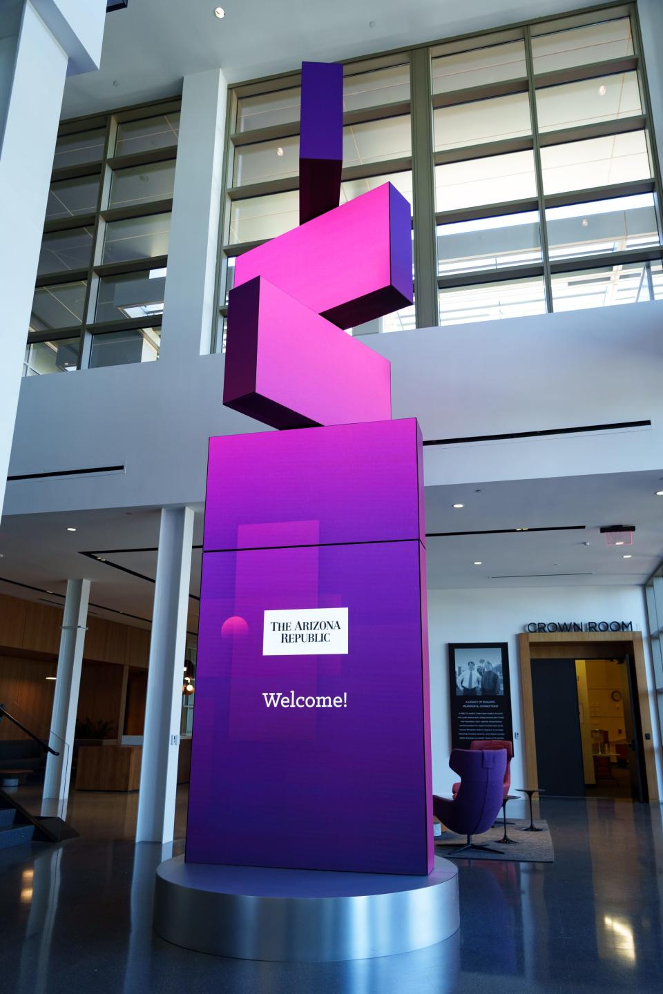 Stacked screens in Insight Enterprises' Lobby turn in 360-degree movements and display a "Welcome" message to The Arizona Republic on March 31, 2023, in Chandler.