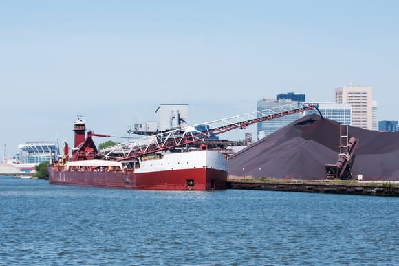 Cargo ship offloading iron ore