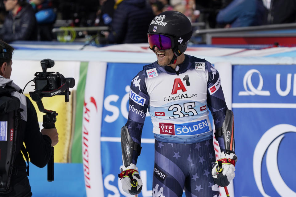 United States' Tommy Ford reacts after crossing the finish line to complete an alpine ski, men's World Cup giant slalom, in Soelden, Austria, Sunday, Oct. 23, 2022. (AP Photo/Giovanni Auletta)