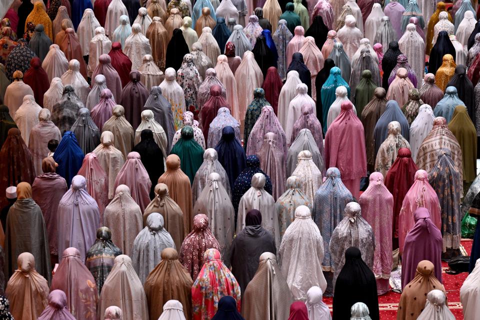 Muslim devotees offer night prayers marking the start of Islam's holy fasting month of Ramadan at Istiqlal mosque in Jakarta on March 11, 2024.