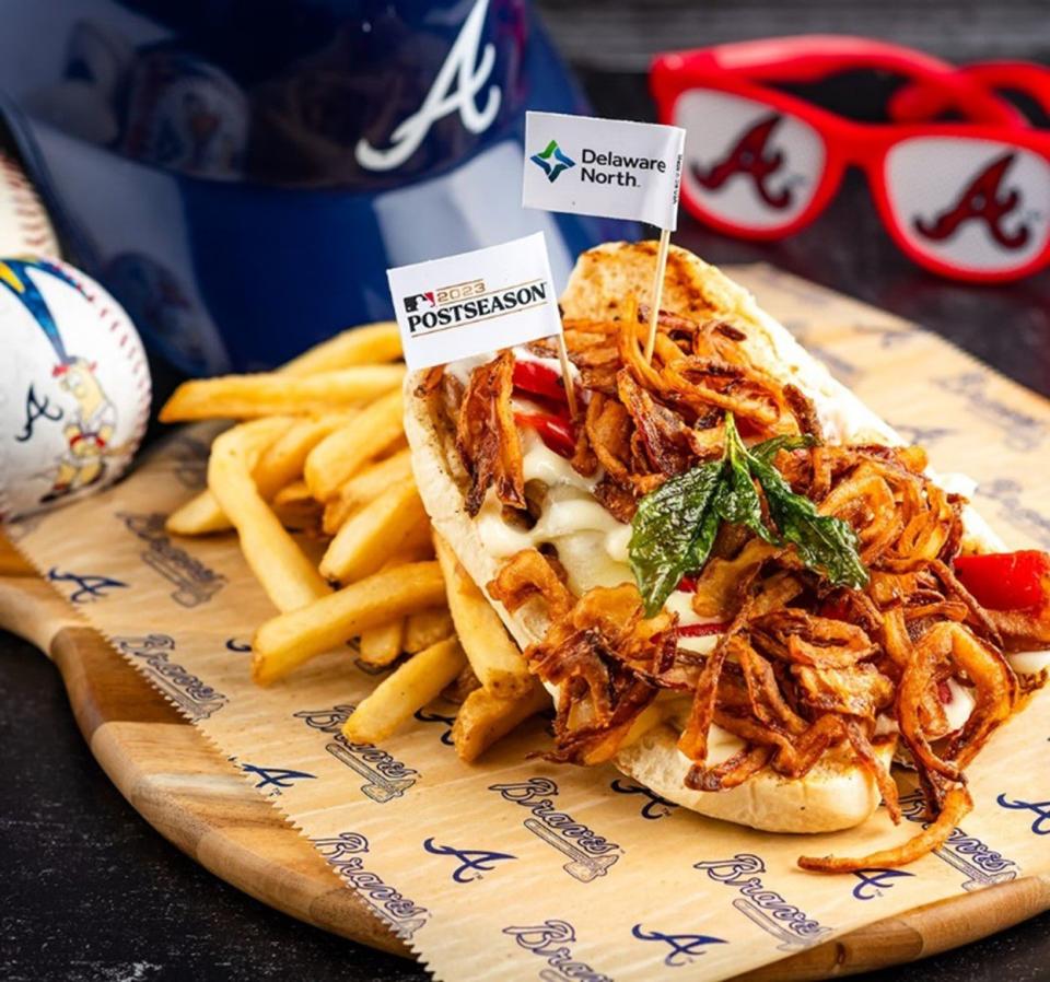 Sweet Grounder: Charbroiled sweet Italian sausage smothered with provolone cheese, roasted red peppers, tobacco onions and garlic aioli on a soft roll.  Available at the concession stand 1871 Grille near section 141. 