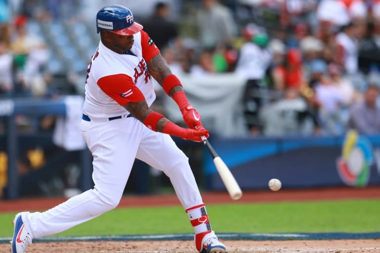 Kennys Vargas of Puerto Rico hits the ball in the bottom of the sixth inning during the World Baseball Classic Pool D Game 5 against Italy March 12, 2017