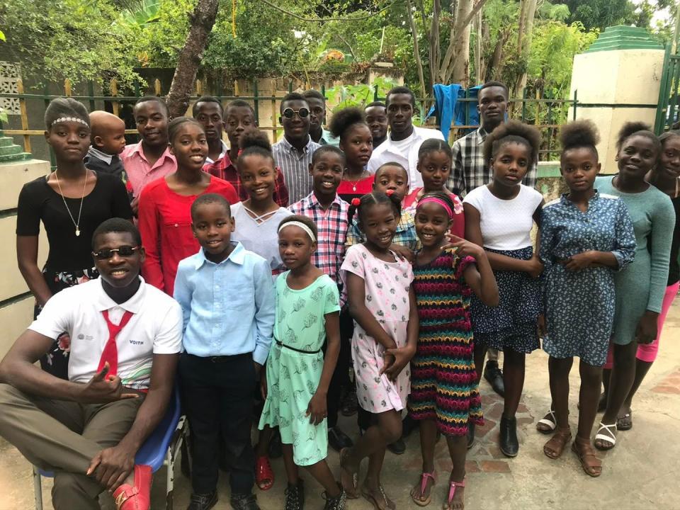 A group of youth and staff at the All Things New orphanage in Haiti gather for a photo. The orphanage was founded -- and is still run -- by a Jacksonville couple who lived there for a time but returned to the U.S. because of worsening civil unrest in Haiti.