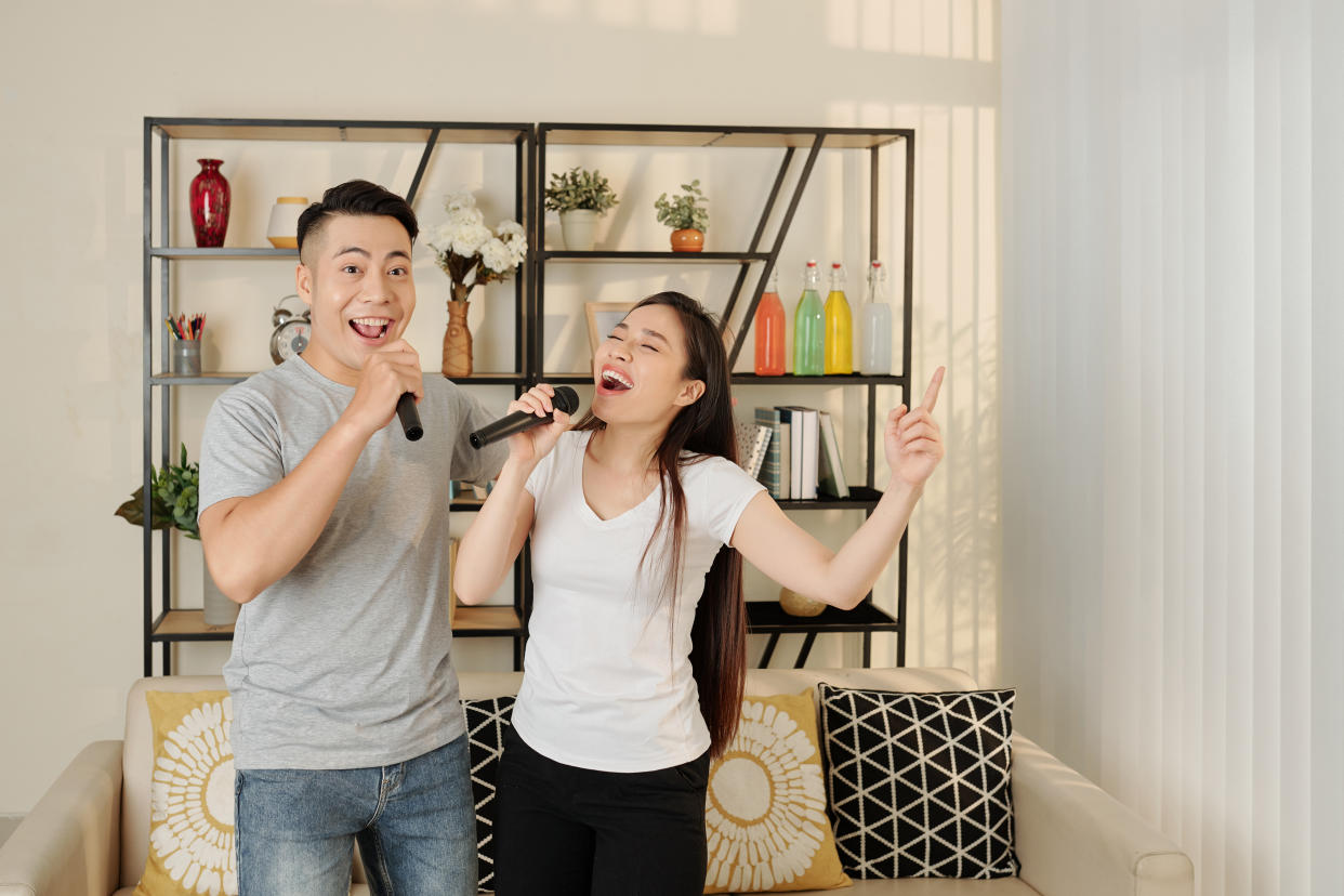 Channel your inner singer spirit and set up a karaoke system at home. (Photo: Gettyimages)