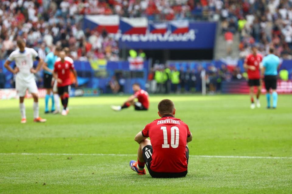 What might have been: Giorgi Chakvetzdze alone with his thoughts following Georgia's draw with Czech Republic <i>(Image: Action Images)</i>