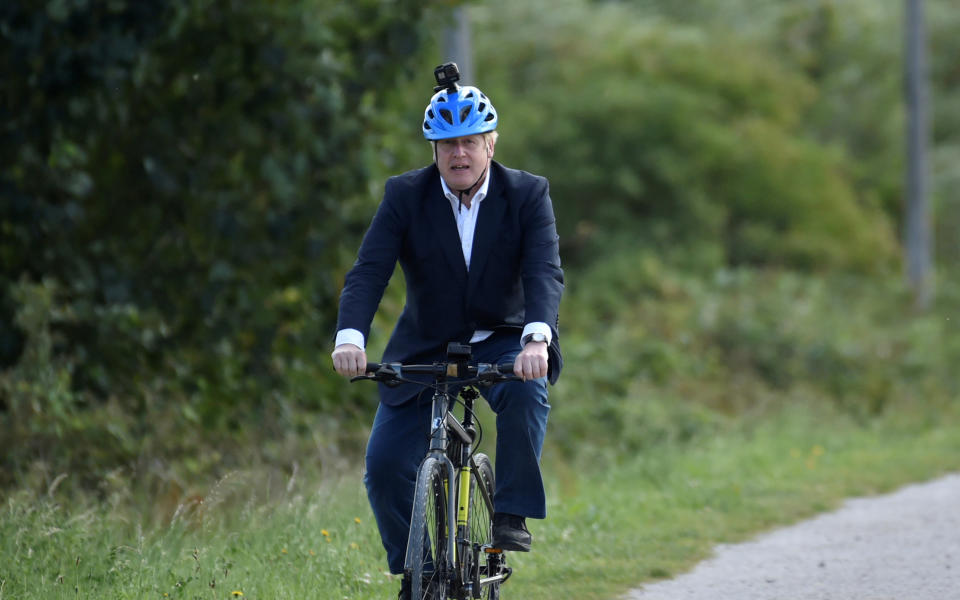 Boris Johnson pictured riding a bike in July last year. His bike ride around London's Olympic Park on Sunday continues to be a talking point. (Rui Vieira/pool via Reuters)