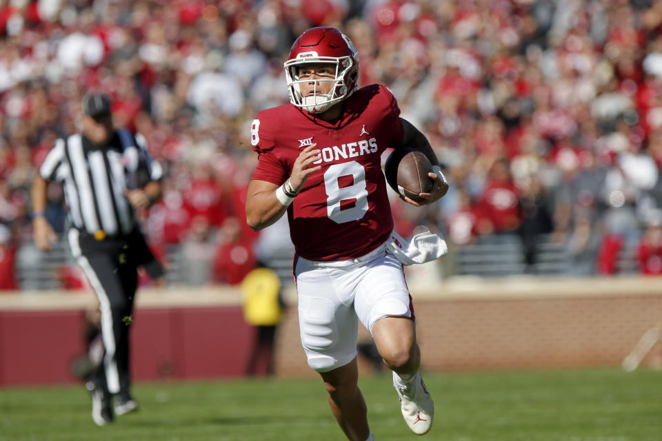 Oklahoma quarterback Dillon Gabriel carries the ball in the first half of an NCAA college football game against Baylor, Saturday, Nov. 5, 2022 in Norman, Okla. (AP Photo/Nate Billings)