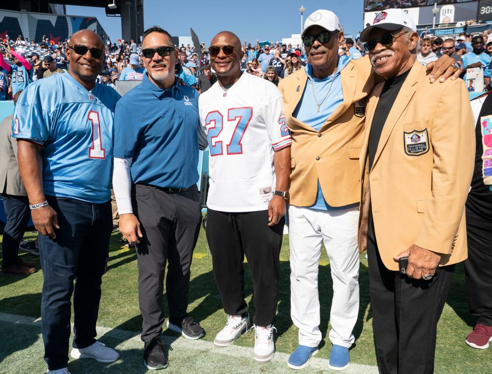 Former Houston Oilers and Tennessee Titans Warren Moon, Kevin Mawae, Eddie George, Robert Brazile and Elvin Bethea pose for a picture before the Tennessee Titans game against the Indianapolis Colts at Nissan Stadium Sunday, Oct. 23, 2022, in Nashville, Tenn.  The Titans held a homecoming celebration for former Oilers and Titans players over the weekend. 