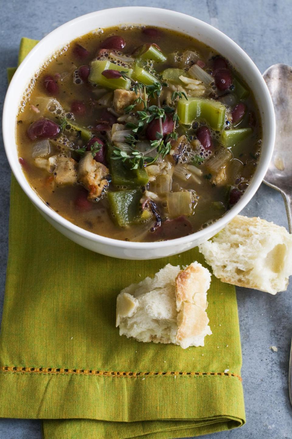 This Jan. 28, 2013 photo shows Mardi Gras red beans and rice soup with andouille sausage is shown served in a bowl in Concord, N.H. (AP Photo/Matthew Mead)