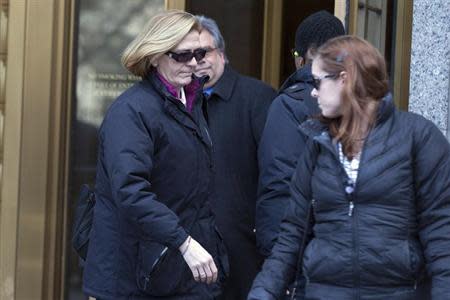 Joann Crupi (L), former portfolio manager for Bernard L. Madoff Investment Securities LLC, exits the Manhattan Federal Court house in New York, March 24, 2014. REUTERS/Brendan McDermid