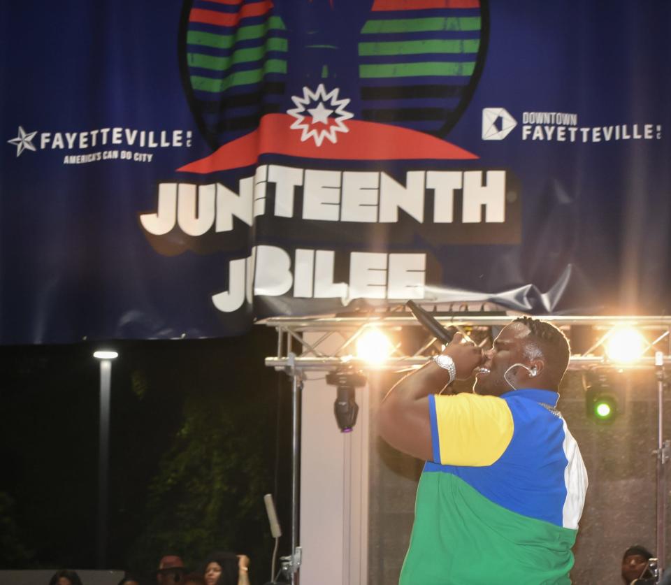 Hip hop artist Morray sings on the Festival Park stage at Fayetteville's first Juneteenth Jubilee in 2022. Performers for the 2023 Jubilee have not yet been announced.