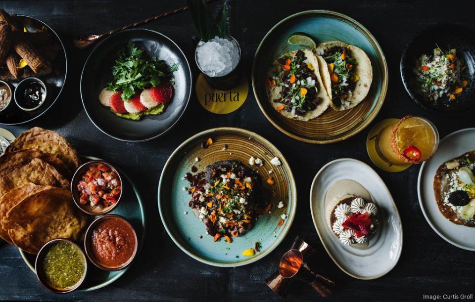 The restaurant at 1961 E. 7th St. is set to debut on Aug. 11 with a dinner and late-night menu. Dishes will honor Mexican culture and be prepared with traditional techniques. Tacos include different fillings including barbacoa, al pastor, lengua, seafood, carne asada and a vegetarian option with crispy potatoes in a chipotle mole sauce. There will also be soups and salads, little bites including dips and salsas, handhelds and entrees. The bar program at Puerta will focus on Mexican-made spirits, beer and wine. Cocktails will be regionally inspired classics made with fresh juice and poured over clear ice into frozen glassware. Five margaritas are on the opening menu, along with six signature cocktails featuring tequila and mezcal. Puerta marks the fourth dining concept in Elizabeth from 1957 Hospitality Group, which also owns and operates The Crunkleton, Rosemont Market & Wine Bar and Cheat’s Cheesesteak Parlor.