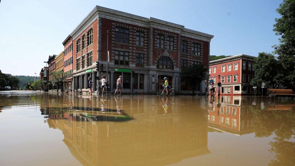 PHOTO: Residents look over the damage after flooding from recent rain storms in Montpelier, Vermont, July 11, 2023. (Brian Snyder/Reuters)