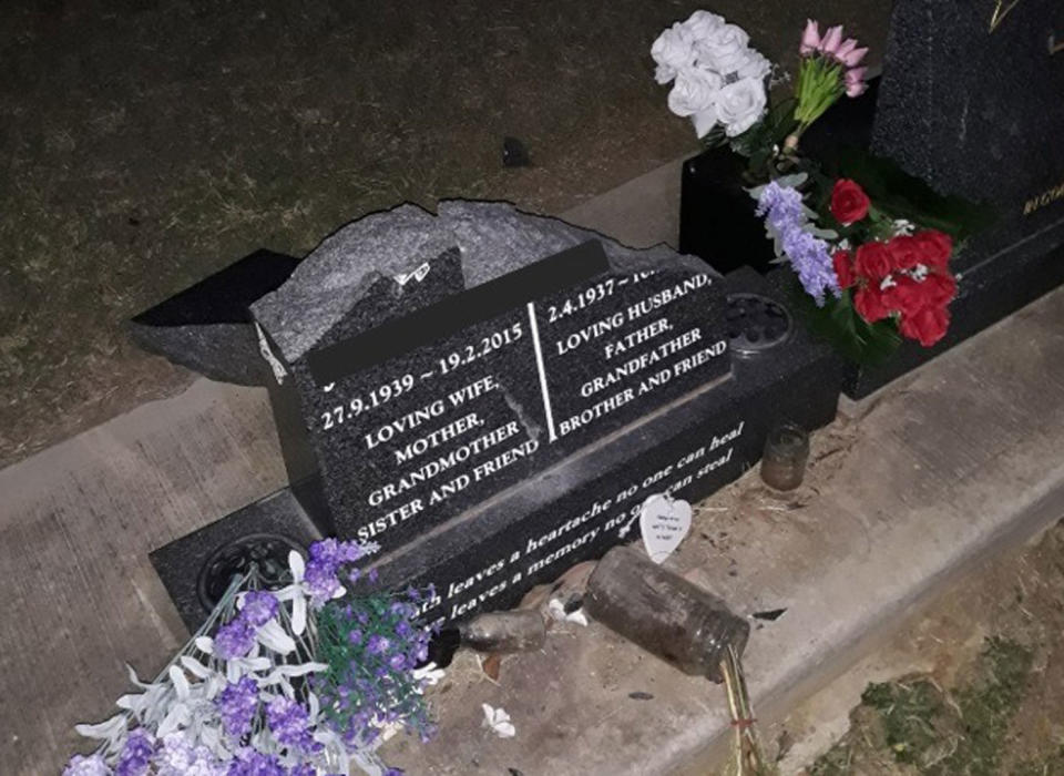 A smashed gravestone is seen at Sedgefield Cemetery.