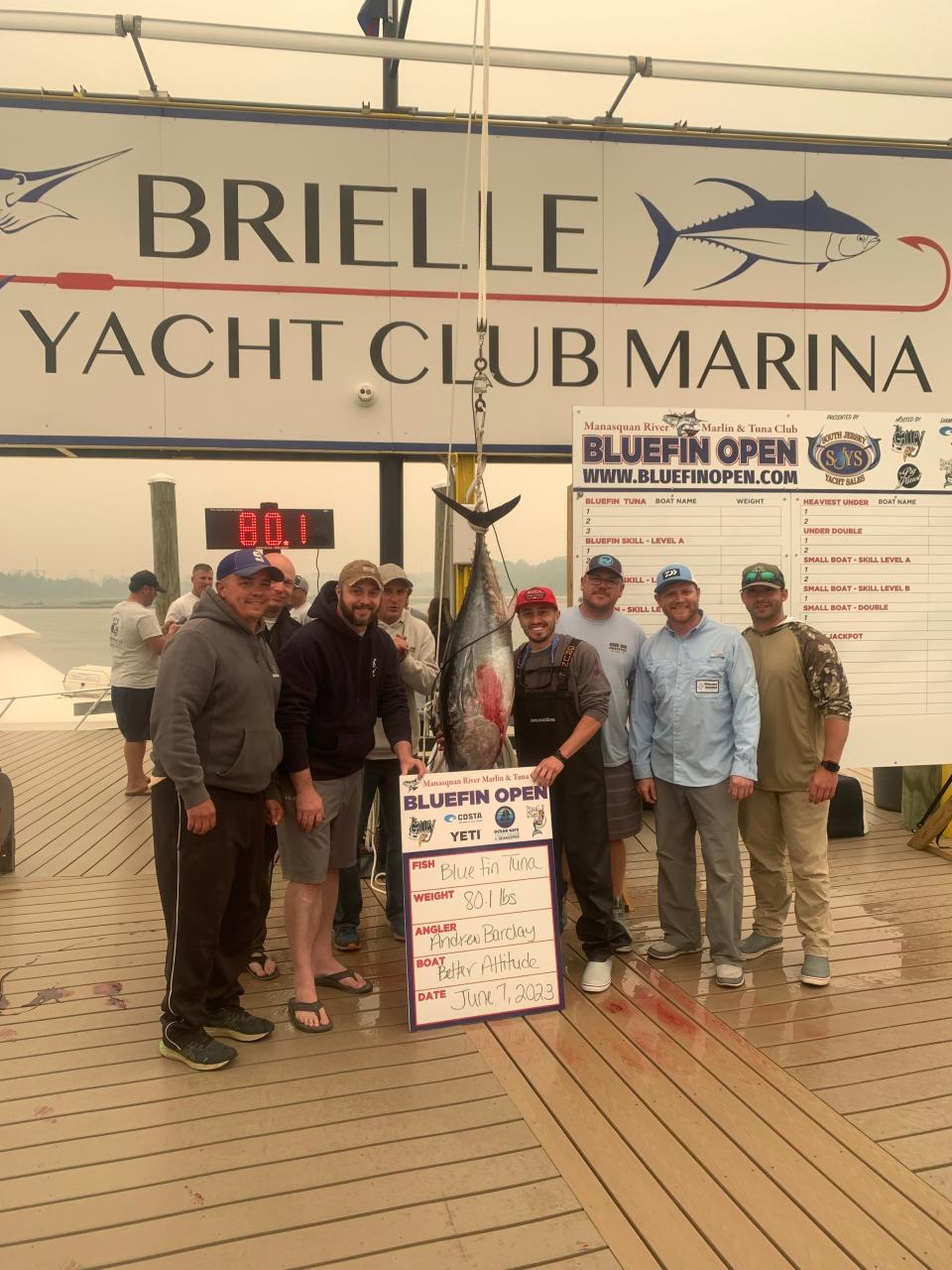The crew of Better Attitude weighs in an 80.1 pound bluefin tuna at Brielle Yacht Club during the Manasquan River Marlin & Tuna Club's Bluefin Open.