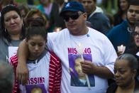 People attend a vigil for Avonte Oquendo, who is missing, in Queens, New York, October 11, 2013. According to family members, Oquendo, a 14-year-old mute and autistic child, was last seen at his Long Island City school in Queens on October 4. (REUTERS/Eduardo Munoz)