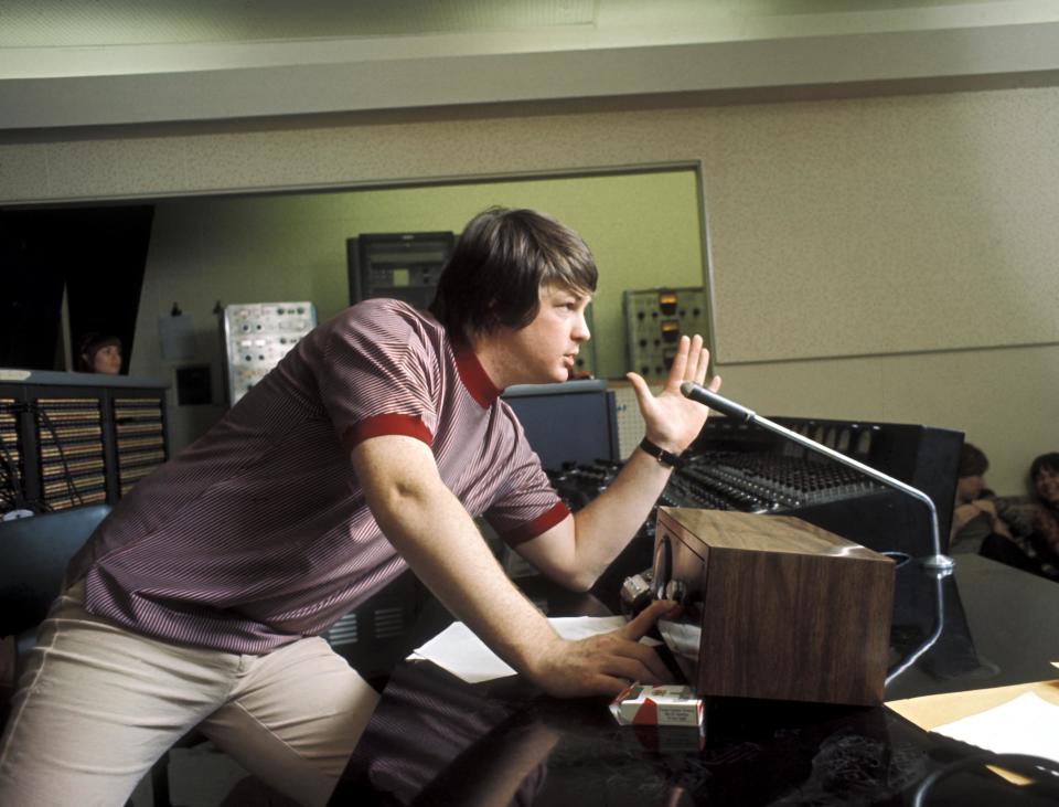 Brian Wilson directs from the control room while recording the album "Pet Sounds" in 1966 in Los Angeles, California.