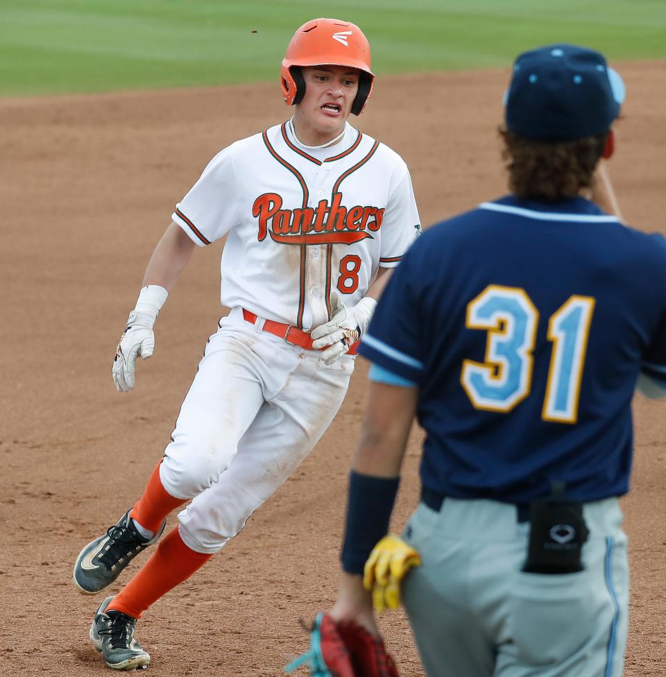 Porterville's Teran Warden drives hard to 3rd base safely against Monache during the 40th annual Tulare/Visalia Pro-PT lower-division Baseball Invitational championship game at RawhideÕs Valley Strong Ballpark in Visalia, Calif., Wednesday, March 27, 2024.