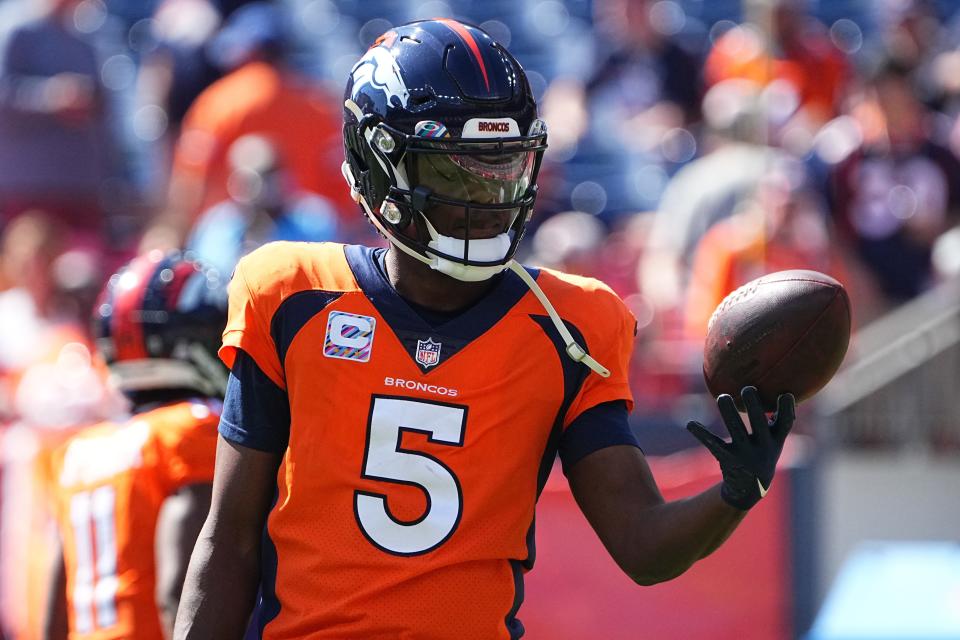 Oct 3, 2021; Denver, Colorado, USA; Denver Broncos quarterback Teddy Bridgewater (5) prior to the game against the Baltimore Ravens at Empower Field at Mile High. Mandatory Credit: Ron Chenoy-USA TODAY Sports