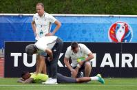 Football Soccer - Euro 2016 - Germany Training - Stade Camille Fournier, Evian-Les-Bains, France - 25/6/16 - Germany's team doctor Hans-Wilhelm Mueller-Wohlfahrt, coach Joachim Loew (not pictured) and Jerome Boateng during training. REUTERS/Denis Balibouse
