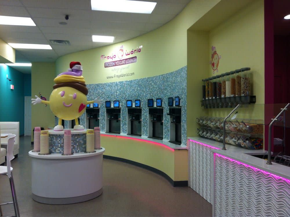Interior of FroyoWorld with cartoon mascot statue