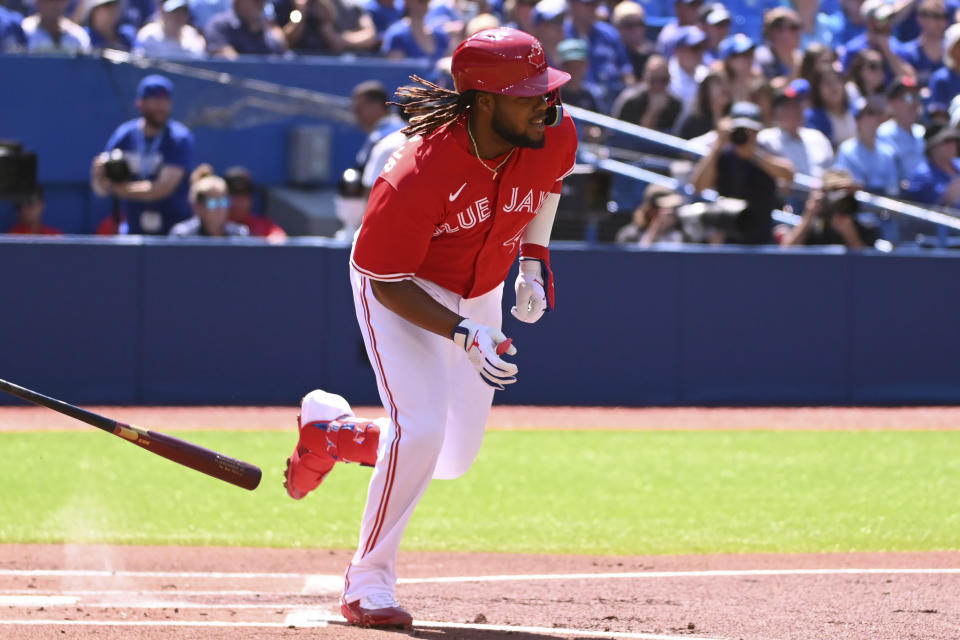 Toronto Blue Jays first baseman Vladimir Guerrero Jr runs out a single during the first inning of a baseball game against the Kansas City Royals, Saturday, July 16, 2022 in Toronto. (Jon Blacker/The Canadian Press via AP)